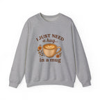 Crewneck Sweatshirt — "I Just Need a Hug in a Mug" Coffee Lover Cozy Pullover