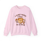 Crewneck Sweatshirt — "I Just Need a Hug in a Mug" Coffee Lover Cozy Pullover